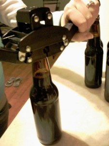 BEER mom capping the brew